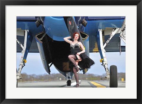 Framed 1940&#39;s style pin-up girl in cocktail dress posing in front of a TBM Avenger Print