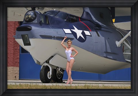 Framed pin-up girl posing with a Catalina seaplane Print
