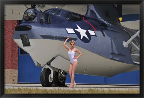 Framed pin-up girl posing with a Catalina seaplane Print