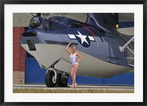 Framed pin-up girl posing with a Catalina seaplane Print