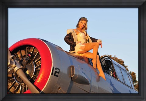 Framed 1940&#39;s style aviator pin-up girl posing with a vintage T-6 Texan aircraft Print