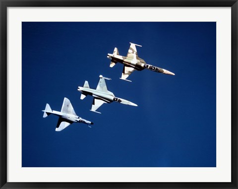 Framed Two F-5 Tiger II&#39;s and an A-4E Skyhawk in flight above the Pacific Ocean Print