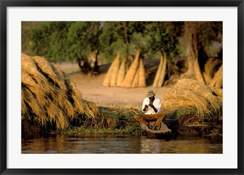 Framed Local Man Fishing and Piles of Straw for Hatch, Okavango Delta, Botswana Print