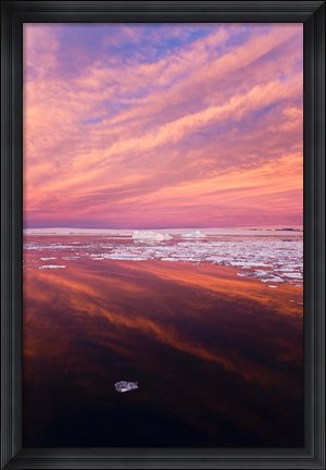 Framed Iceberg and floes in the ocean at sunrise, Antarctica Print