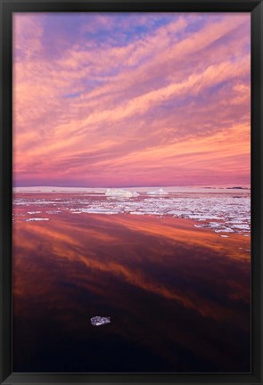 Framed Iceberg and floes in the ocean at sunrise, Antarctica Print