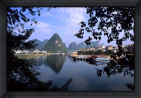 Framed Wonderful ragged Limestone Mountains and Li River and city life of Yangshuo area of China Print
