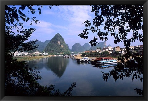Framed Wonderful ragged Limestone Mountains and Li River and city life of Yangshuo area of China Print