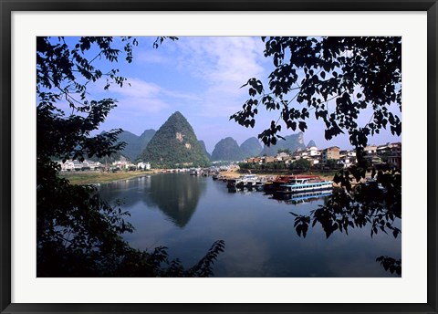 Framed Wonderful ragged Limestone Mountains and Li River and city life of Yangshuo area of China Print