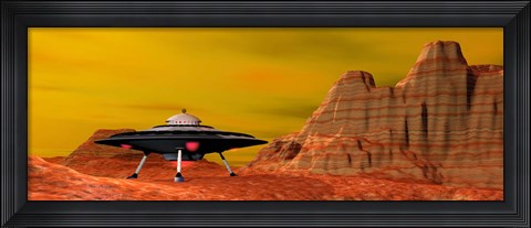 Framed UFO landing on a desert landscape Print