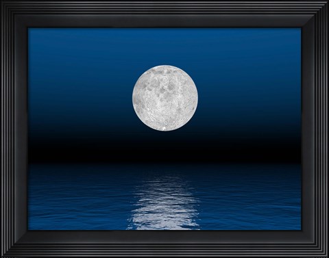 Framed Beautiful full moon against a deep blue sky over the ocean Print