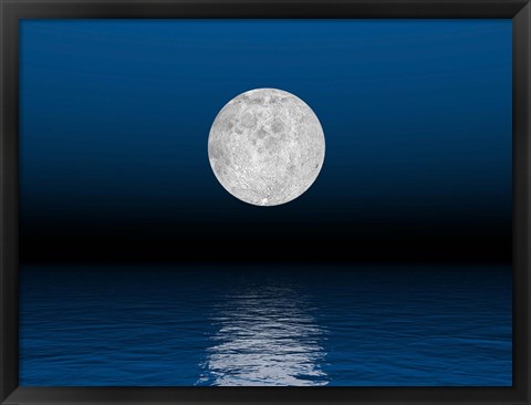 Framed Beautiful full moon against a deep blue sky over the ocean Print