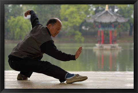 Framed Man Doing Tai Chi Exercises at Black Dragon Pool with One-Cent Pavilion, Lijiang, Yunnan Province, China Print