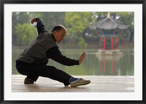 Framed Man Doing Tai Chi Exercises at Black Dragon Pool with One-Cent Pavilion, Lijiang, Yunnan Province, China Print