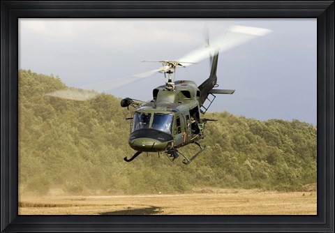 Framed Italian Air Force AB-212 ICO helicopter departs the landing zone, Italy Print