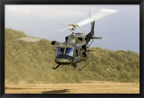 Framed Italian Air Force AB-212 ICO helicopter departs the landing zone, Italy Print