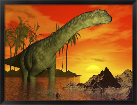 Framed Large Argentinosaurus dinosaur in water at sunset Print