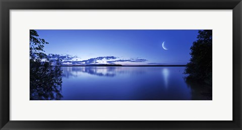 Framed Moon rising over tranquil lake against moody sky, Mozhaisk, Russia Print