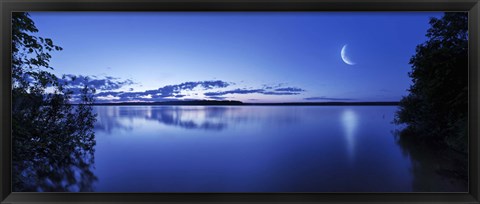 Framed Moon rising over tranquil lake against moody sky, Mozhaisk, Russia Print