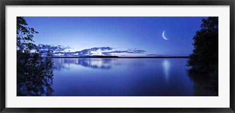 Framed Moon rising over tranquil lake against moody sky, Mozhaisk, Russia Print