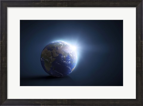 Framed Planet Earth and sunlight on a dark blue background Print