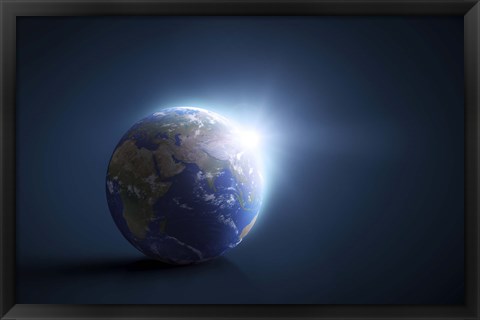 Framed Planet Earth and sunlight on a dark blue background Print