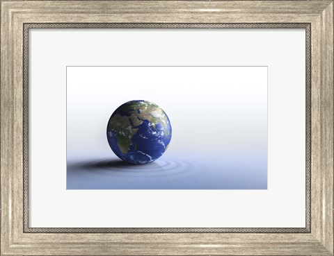 Framed Planet Earth on a blue floor Print