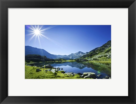 Framed Muratov Lake against blue sky and bright sun in Pirin National Park, Bulgaria Print