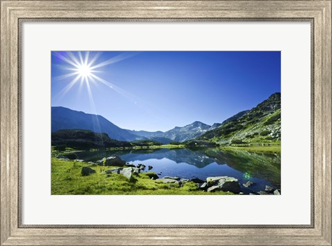 Framed Muratov Lake against blue sky and bright sun in Pirin National Park, Bulgaria Print