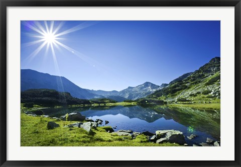 Framed Muratov Lake against blue sky and bright sun in Pirin National Park, Bulgaria Print