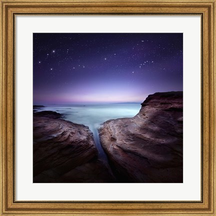Framed Two large rocks in a sea, against starry sky Print