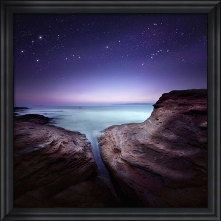 Framed Two large rocks in a sea, against starry sky Print