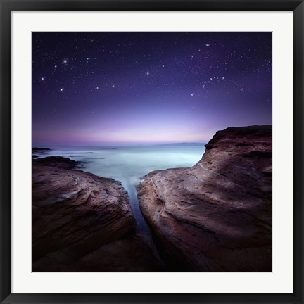 Framed Two large rocks in a sea, against starry sky Print