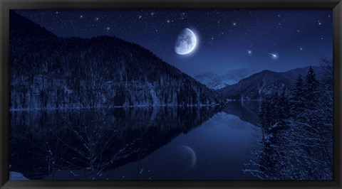 Framed Moon rising over tranquil lake in the misty mountains against starry sky Print