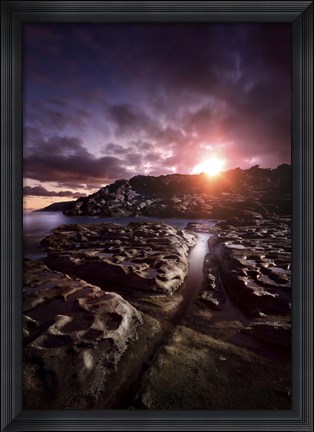 Framed Rocky shore and tranquil sea against cloudy sky at sunset, Sardinia, Italy Print
