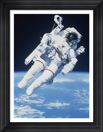 Framed AstronautTaking a Spacewalk Print