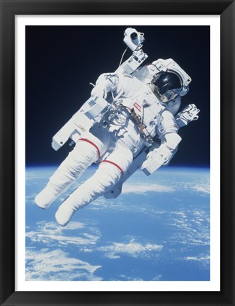 Framed AstronautTaking a Spacewalk Print