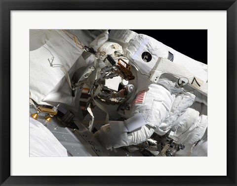 Framed Maintenance on the International Space Station Print