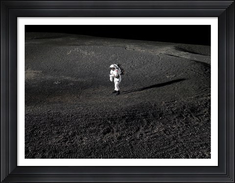Framed Space Suit engineer simulates work inside a crater in Johnson Space Center&#39;s Lunar Yard Print