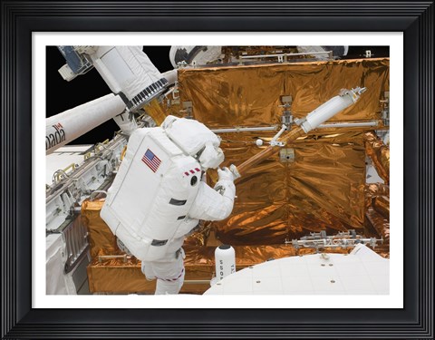 Framed Astronaut works with the Hubble Space Telescope in the cargo bay of Atlantis Print