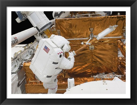 Framed Astronaut works with the Hubble Space Telescope in the cargo bay of Atlantis Print