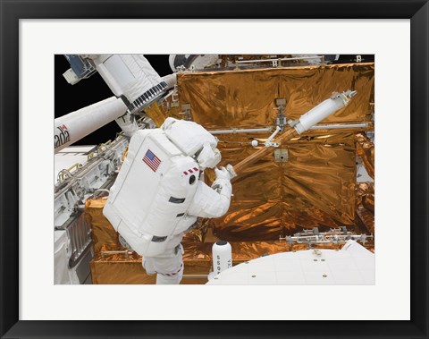 Framed Astronaut works with the Hubble Space Telescope in the cargo bay of Atlantis Print