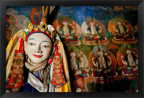 Framed Religious statue infront of Buddha mural at Shey Palace, Ladakh, India Print