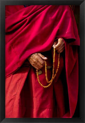 Framed Hands of a monk in red holding prayer beads, Leh, Ladakh, India Print