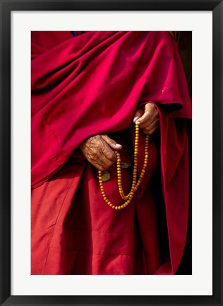 Framed Hands of a monk in red holding prayer beads, Leh, Ladakh, India Print