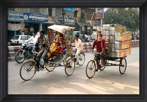 Framed People and cargo move through streets via rickshaw, Varanasi, India Print