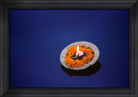 Framed Flower candle in the Ganges River, Varanasi, India Print