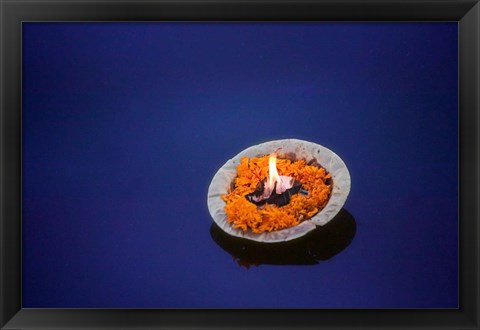 Framed Flower candle in the Ganges River, Varanasi, India Print