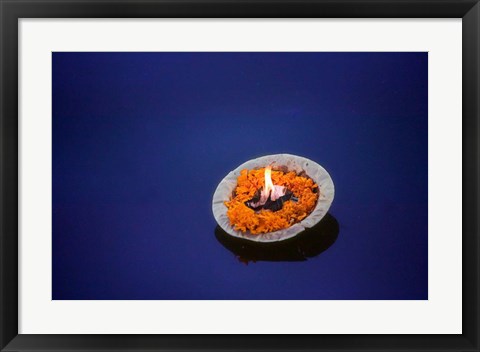 Framed Flower candle in the Ganges River, Varanasi, India Print