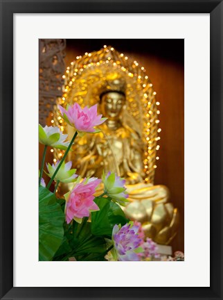 Framed Pink lotus flowers in front of gold statue, Kek Lok Si Temple, Island of Penang, Malaysia Print