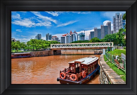 Framed Singapore skyline and tug boats on river. Print